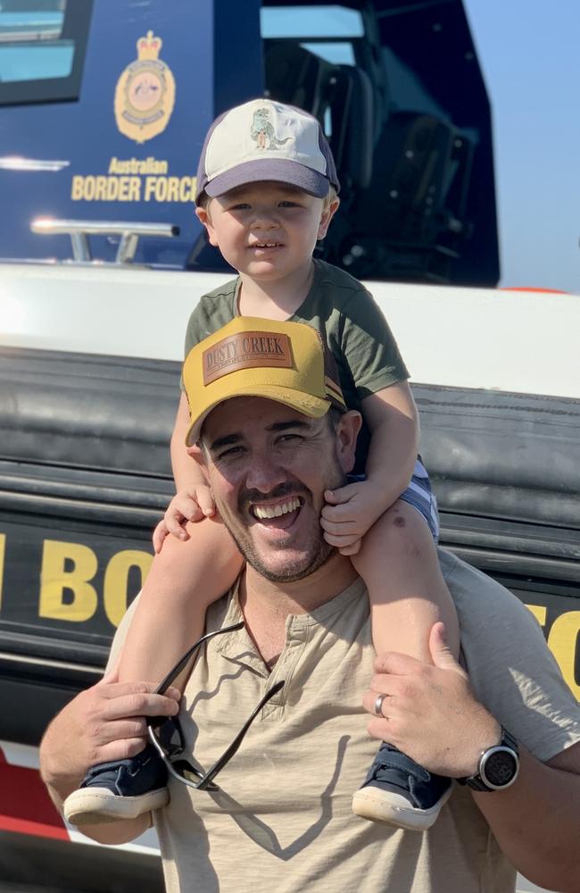 Harry Marshall, 2, gets a lift from dad Dan Marshall at the Pitch Black Open Day at RAAF Darwin. Saturday, August 27, 2022. Picture: Tara Miko