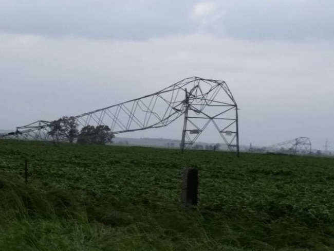 Severe winds toppled at least 22 electricity transmission towers, shutting down the state’s power supplies. Picture: Debbie Prosser