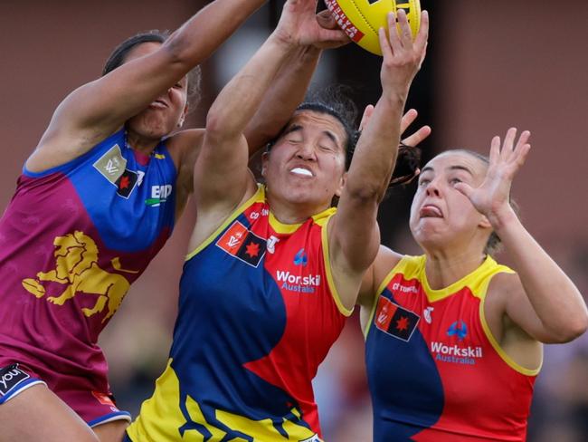 BRISBANE, AUSTRALIA - SEPTEMBER 29: Courtney Hodder of the Lions and Rachelle Martin of the Crows compete for the ball during the 2024 AFLW Round 05 match between the Brisbane Lions and the Adelaide Crows at Brighton Homes Arena on September 29, 2024 in Ipswich, Australia. (Photo by Russell Freeman/AFL Photos via Getty Images)