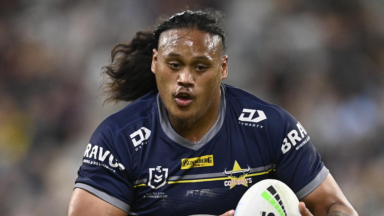 TOWNSVILLE, AUSTRALIA - JULY 15: Luciano Leilua of the Cowboys runs the ball during the round 18 NRL match between the North Queensland Cowboys and the Cronulla Sharks at Qld Country Bank Stadium, on July 15, 2022, in Townsville, Australia. (Photo by Ian Hitchcock/Getty Images)