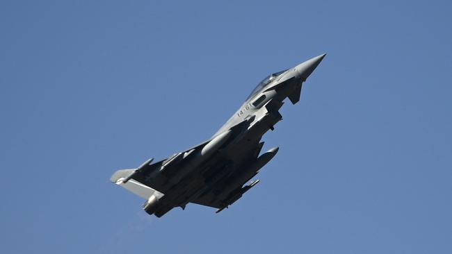 An Italian fighter jet, similar to the pictured Spanish Eurofighter EF-2000 Typhoon, crashed in near the Daly River community in July, triggering a search and rescue operation. (Photo by Nikolay DOYCHINOV / AFP).