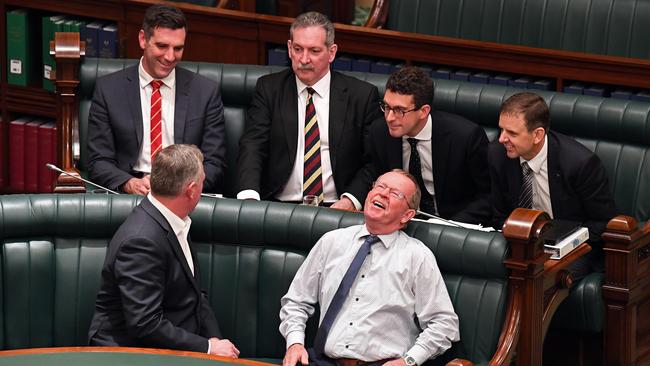 Liberal MPs Nick McBride, Fraser Ellis, Steve Murray and Dan Cregan, cross the floor with independent MPs Troy Bell and Geoff Brock. Picture: Tom Huntley