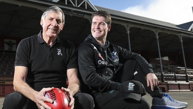 Russell Ebert, the week he turned 70, with Will Northeast, the son of former teammate and eight-time premiership player Paul Northeast, working together in the Port community program. Picture: Sarah Reed