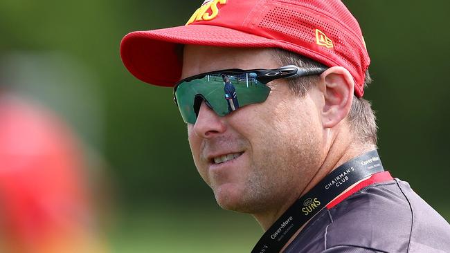 GOLD COAST, AUSTRALIA - MARCH 16: Head coach Stuart Dew looks onduring a Gold Coast Suns training session at Metricon Stadium on March 16, 2022 in Gold Coast, Australia. (Photo by Chris Hyde/Getty Images)