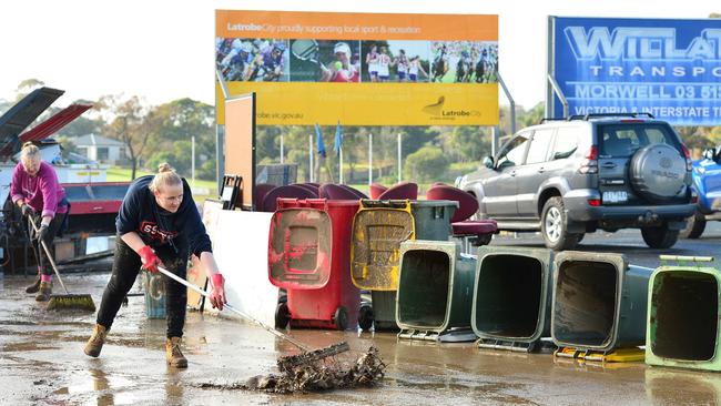 Traralgon Football and Netball Club clean up after the recent floods. Picture: Nicki Connolly