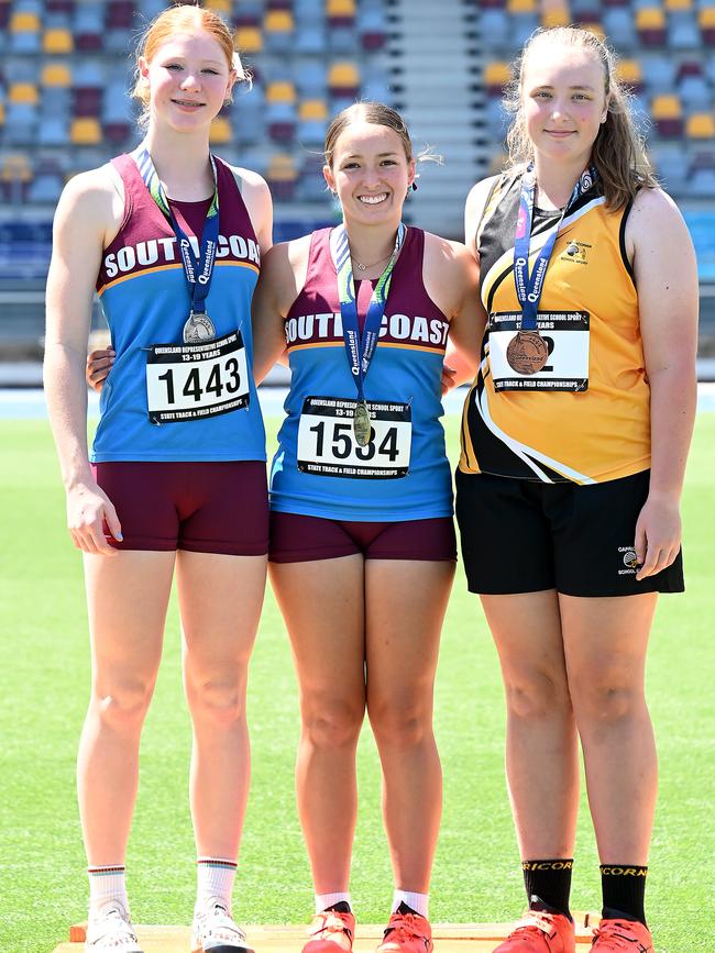 Jalyn South, middle, with fellow podium finishers at the Queensland Representative School Sport track and field championships