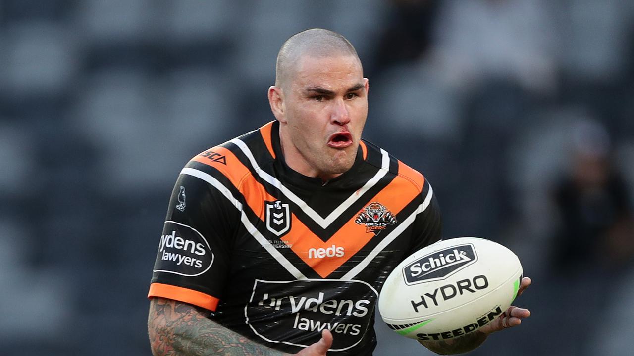 The Tigers have been slammed for their handling of Russell Packer (C) and Josh Reynolds.