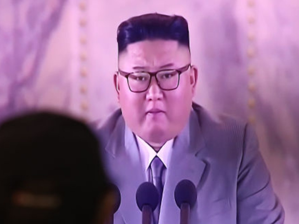 A man watches a television showing North Korea’s ruling party's founding 75th Anniversary Day military parade. Picture: Chung Sung-Jun / Getty Images