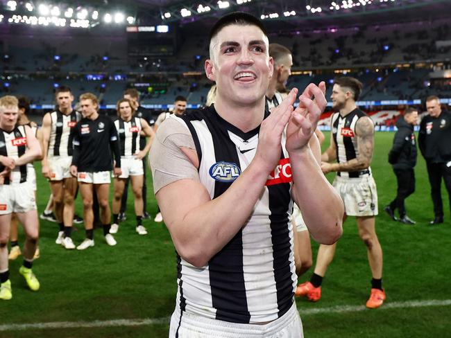 MELBOURNE, AUSTRALIA - JUNE 16: Brayden Maynard of the Magpies celebrates after his 200th match during the 2024 AFL Round 14 match between the North Melbourne Kangaroos and the Collingwood Magpies at Marvel Stadium on June 16, 2024 in Melbourne, Australia. (Photo by Michael Willson/AFL Photos via Getty Images)