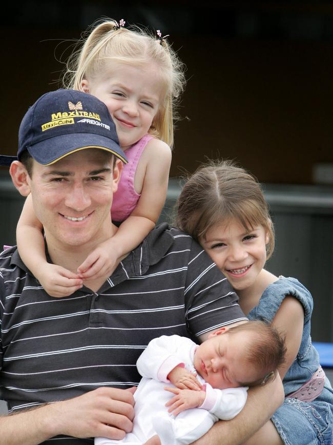 Eighteen years ago … Jockey Vlad Duric with his daughters Sage (back), 3, Liljana, 4, and Audrey, 3 weeks. Picture: File