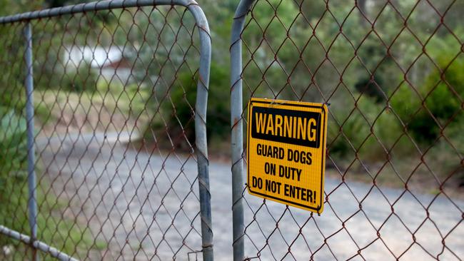 A warning sign at the Greenbank property. Picture: David Clark