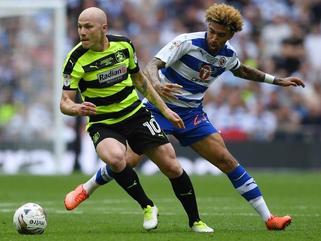 Newly-promoted Huddersfield Town are set to submit a club record bid to retain Aaron Mooy.