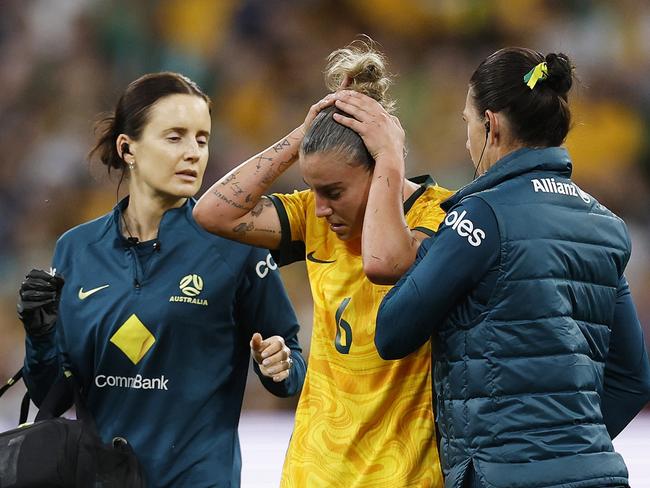 MELBOURNE, AUSTRALIA - DECEMBER 04: Chloe Logarzo of Australia reacts after a head clash with Chan Pi-Han of Chinese Taipei during the International Friendly match between Australia Matildas and Chinese Taipei at AAMI Park on December 04, 2024 in Melbourne, Australia. (Photo by Daniel Pockett/Getty Images)