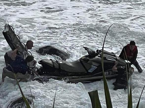 WATCH: Jet ski washes up on rocks in big swell