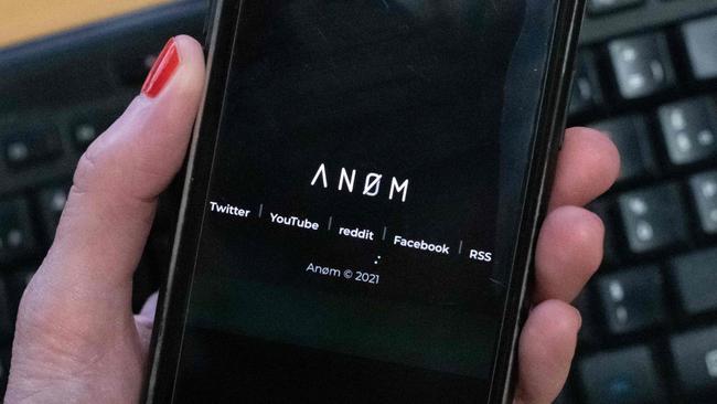 (FILES) An illustration picture shows the ANoM logo displayed on the screen of an smartphone on June 8, 2021 in Paris. The US offered a $5 million reward on June 7, 2023, for the Swedish man who marketed an encrypted communications network for drug traffickers -- unaware that the technology was developed by the FBI. The State Department posted the hefty reward for Maximilian Rivkin, who has escaped arrest since the 2021 takedown of the ANOM network. (Photo by Olivier MORIN / AFP)