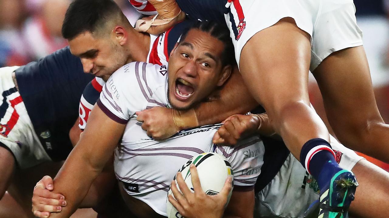 Martin Taupau of the Sea Eagles appeals to the referee in a tackle.