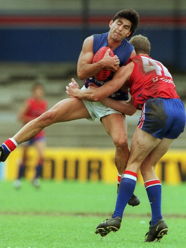 David Sheahan (right) tackles Jose Romero in a Western Bulldogs intra club match at Whitten Oval.