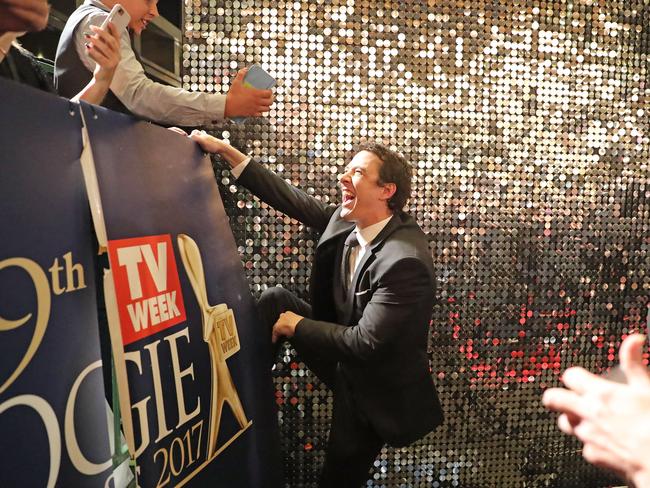 Samuel Johnson climbs into the crowd to meet fans at the 59th Annual Logie Awards. Picture: Getty