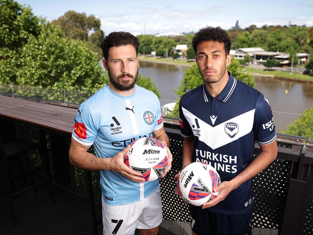 Melbourne City’s Mathew Leckie (left) and Melbourne Victory’s Nishan Velupillay expect a great atmosphere at Saturday night’s derby. Picture: Robert Cianflone/Getty Images