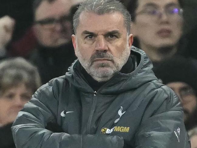 Tottenham Hotspur's Greek-Australian Head Coach Ange Postecoglou looks on during the English FA Cup fourth round football match between Aston Villa and Tottenham Hotspur at Villa Park in Birmingham, central England on February 9, 2025. (Photo by JUSTIN TALLIS / AFP) / RESTRICTED TO EDITORIAL USE. No use with unauthorized audio, video, data, fixture lists, club/league logos or 'live' services. Online in-match use limited to 120 images. An additional 40 images may be used in extra time. No video emulation. Social media in-match use limited to 120 images. An additional 40 images may be used in extra time. No use in betting publications, games or single club/league/player publications. /