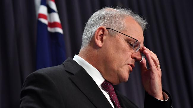 Prime Minister Scott Morrison gets emotional during the press conference.