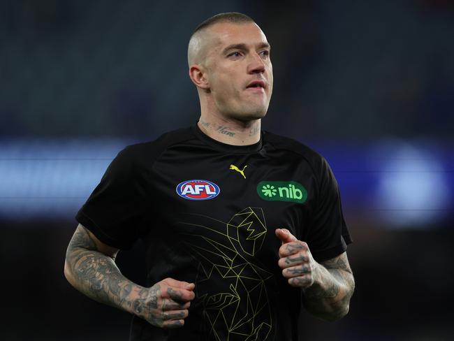 MELBOURNE, AUSTRALIA - AUGUST 03: Dustin Martin of the Tigers warms up before the round 21 AFL match between North Melbourne Kangaroos and Richmond Tigers at Marvel Stadium, on August 03, 2024, in Melbourne, Australia. (Photo by Daniel Pockett/Getty Images)