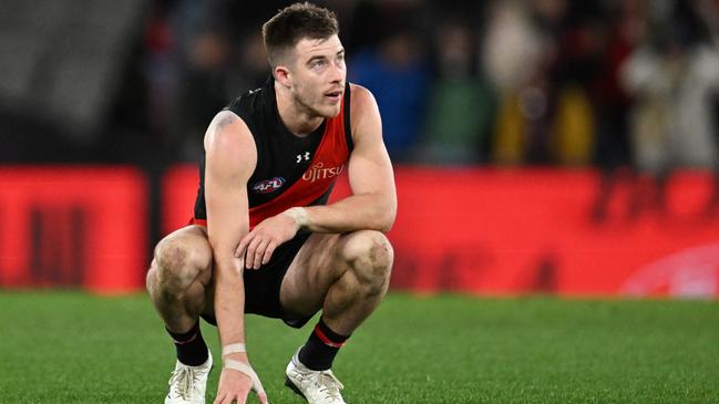 MELBOURNE, AUSTRALIA - JULY 19: Zach Merrett of the Bombers reacts on the final siren during the round 19 AFL match between Essendon Bombers and Adelaide Crows at Marvel Stadium, on July 19, 2024, in Melbourne, Australia. (Photo by Daniel Pockett/Getty Images)