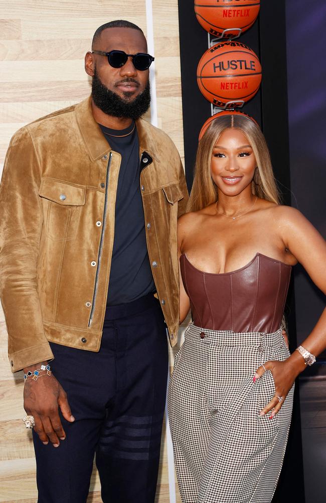 LeBron James and his wife Savannah. (Photo by Michael Tran / AFP)