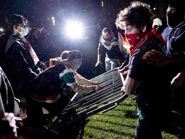 Counter protesters attack a pro-Palestinian encampment set up on the campus of the University of California Los Angeles. Picture: AFP