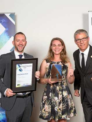 Michael Cousins and Shanna Bignell from Typefi with former deputy mayor Tim Dwyer accept the Small Business Award at the 2016 Export Awards. Picture: Contributed