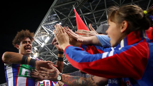 Knight Dane Gagai celebrates with fans during the Round 23 win over Parramatta. Photo: Getty Images