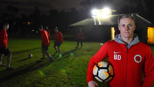 Port Phillip Spiders Football Club coach Ben Doree with players training in the background. Picture: Josie Hayden
