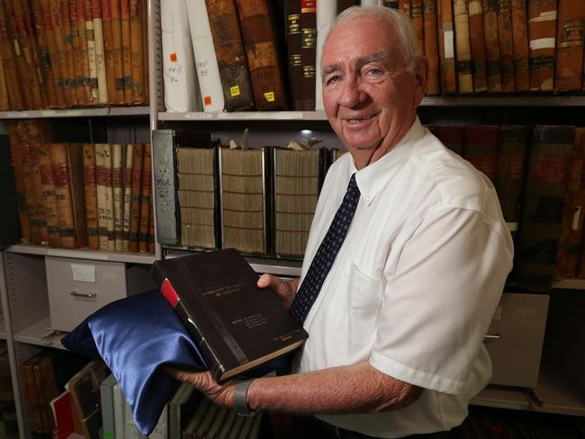 ***THIS IS STRICTLY EMBARGOED UNTIL JANUARY 1, 2019***Former Qld Premier Mike Ahern with the original Fitzgerald Report at Qld State Archives.December 20th, 2018. (AAP Image/Richard Waugh).