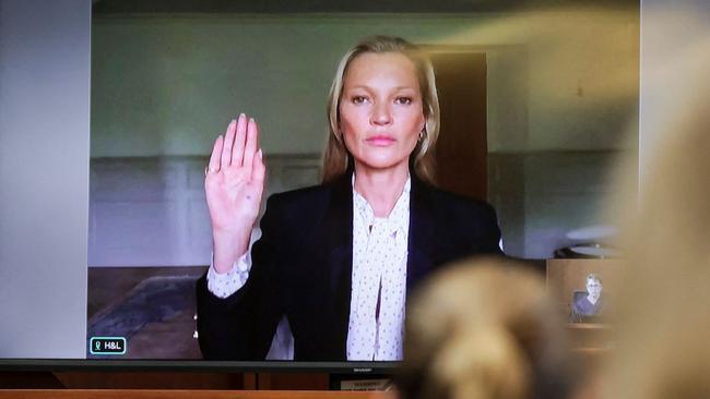 Kate Moss is sworn in via video link from England at the Fairfax County Circuit Courthouse in Virginia on Wednesday. Picture: AFP