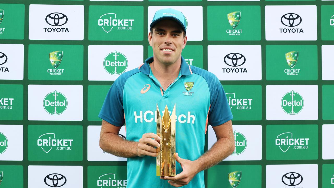 Xavier Bartlett of Australia poses with the player of the series trophy after game three of the Men's One Day International match between Australia and West Indies at Manuka Oval on February 06, 2024 in Canberra, Australia. (Photo by Matt King/Getty Images)