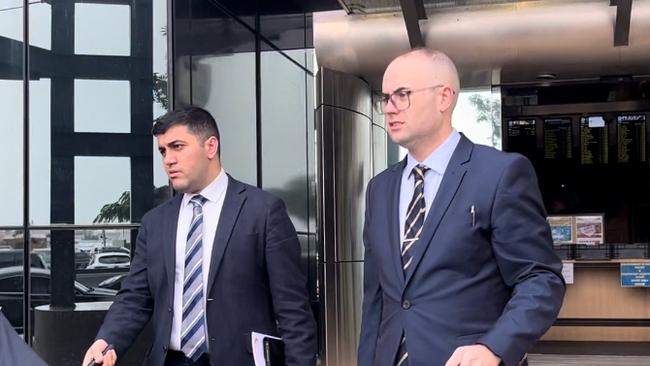 Whitefox Recruitment's Luke Hemmings (right) leaving the courthouse with his lawyer after appearing for the first time since being charged with fraud. Picture: Jessica Paul