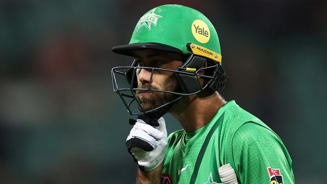 SYDNEY, AUSTRALIA - DECEMBER 05: Glenn Maxwell of the Stars leaves the field after being dismissed by Sean Abbott of the Sixers during the Men's Big Bash League match between the Sydney Sixers and the Melbourne Stars at Sydney Cricket Ground, on December 05, 2021, in Sydney, Australia. (Photo by Cameron Spencer/Getty Images)