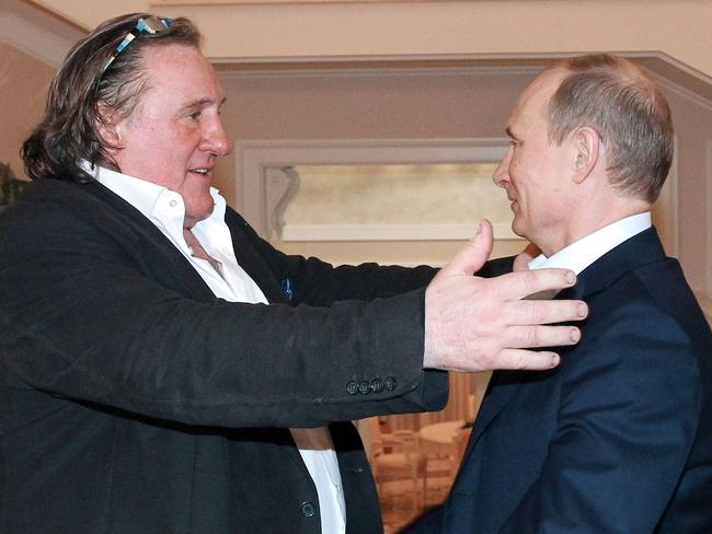 Unlikely friends ... Russian President Vladimir Putin, right, greets Depardieu during their meeting in Putin's residence in Sochi. Picture: AFP PHOTO/RIA-NOVOSTI/MIKHAIL KLIMENTYEV