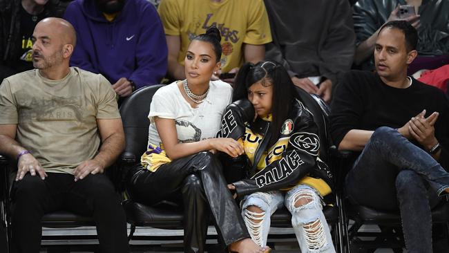 Kim Kardashian and daughter North West attend the Western Conference Semi-final Playoff game between the Los Angeles Lakers and Golden State Warriors. Photo by Kevork Djansezian/Getty Images.