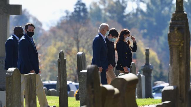 US President-elect Joe Biden, centre, arrives at St. Joseph on the Brandywine Roman Catholic Church in Wilmington, Delaware today. Picture: AFP