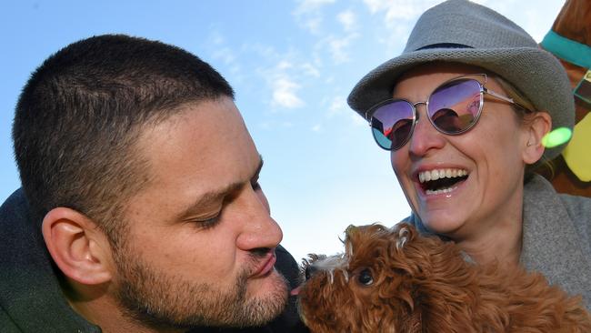 Brendon Fevola gets a kiss from Lizzie-Rose - FiFi's dog. Picture: Nicole Garmston