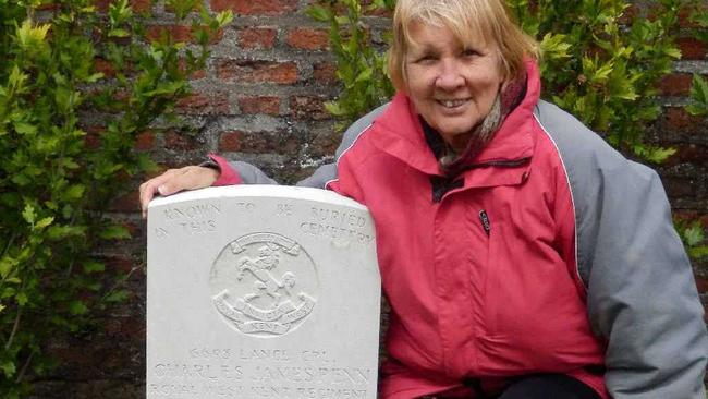 Pam Venn at Charles Penn’s headstone in the Tuileries Cemetery, Belgium, in May 2014. Picture: Contributed