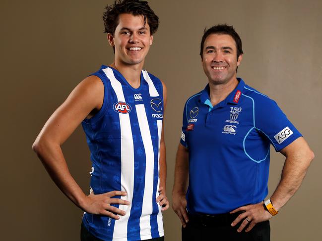 Curtis Taylor gets to know his new coach Brad Scott.