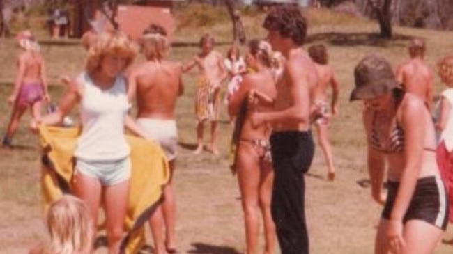 Debra Hood (holding yellow towel) speaks with fellow Port Macquarie High School students during a Year 10 science excursion in 1979. Picture: Supplied