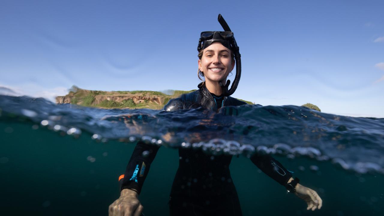 Georgie Pierce takes people diving with turtles at Cook Island in Northern NSW. Picture: Luke Marsden