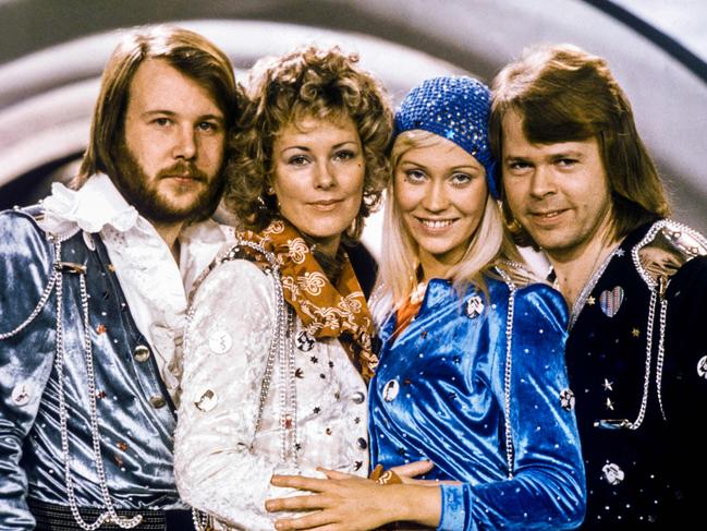 (FILES) Picture taken in 1974 in Stockholm shows the Swedish pop group Abba with its members (L-R) Benny Andersson, Anni-Frid Lyngstad, Agnetha Faltskog and Bjorn Ulvaeus posing after winning the Swedish branch of the Eurovision Song Contest with their song "Waterloo". In May 2024, Sweden hosts the "Eurovision" contest for the seventh time, in Malmoe, in the south of the country, an opportunity to celebrate the jubilee of the group's victory, despite the fact that they had promised not to attend. (Photo by Olle LINDEBORG / TT News Agency / AFP) / Sweden OUT