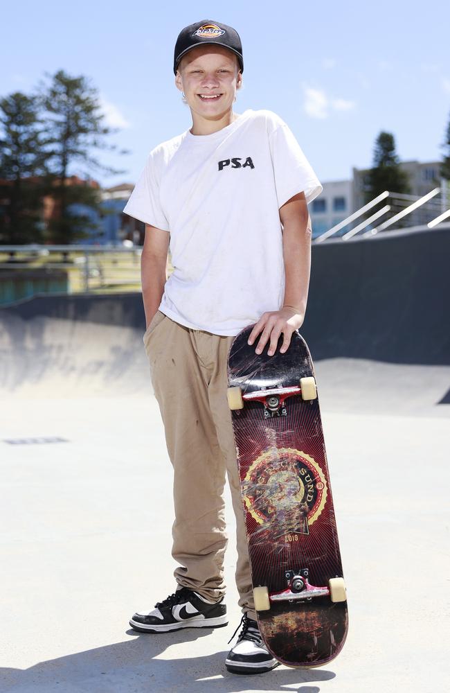 Hayden Gallagher, 14, with his skateboard at Bondi. Picture: Tim Hunter.