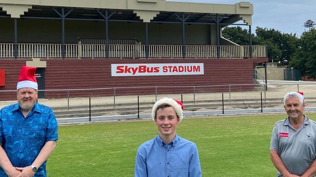 Pastor Mark Whitby, Cr Liam Hughes and Adrian Lloyd at SkyBus Stadium.