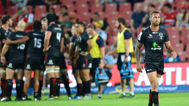 Quade Cooper makes his way from the field after being sent off against the Lions.