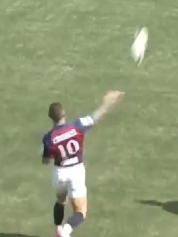 Quade Cooper launches a NFL pass during a rugby game.